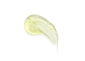 Photo of Smear of yellow ointment on white background, top view