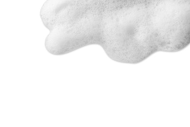 Photo of Fluffy soap foam isolated on white, top view