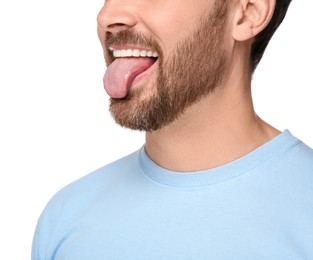 Man showing his tongue on white background, closeup