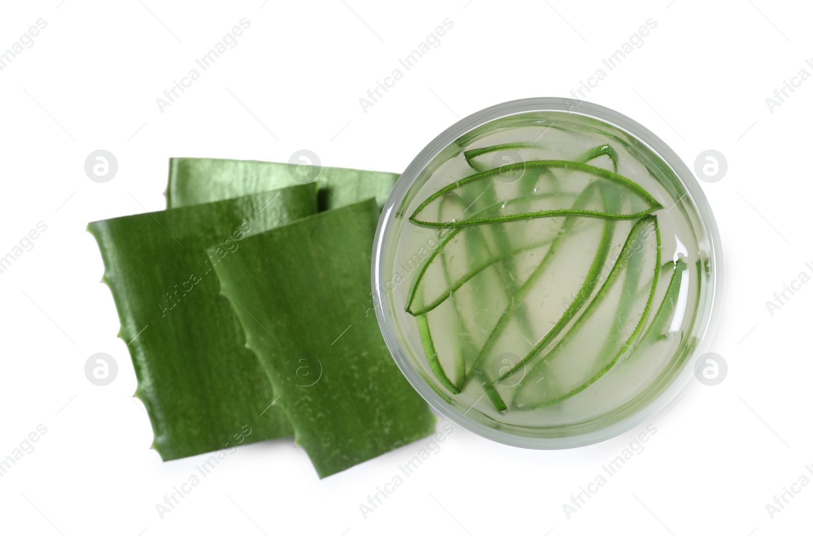 Photo of Tasty aloe juice in glass and cut leaves isolated on white, top view