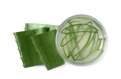 Photo of Tasty aloe juice in glass and cut leaves isolated on white, top view