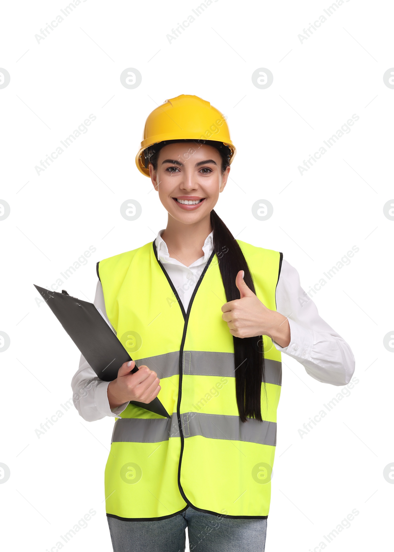 Photo of Engineer in hard hat holding clipboard and showing thumb up on white background