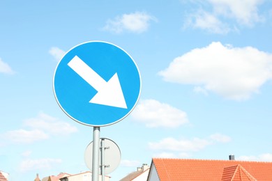 Photo of Traffic sign Keep Right against blue sky, space for text