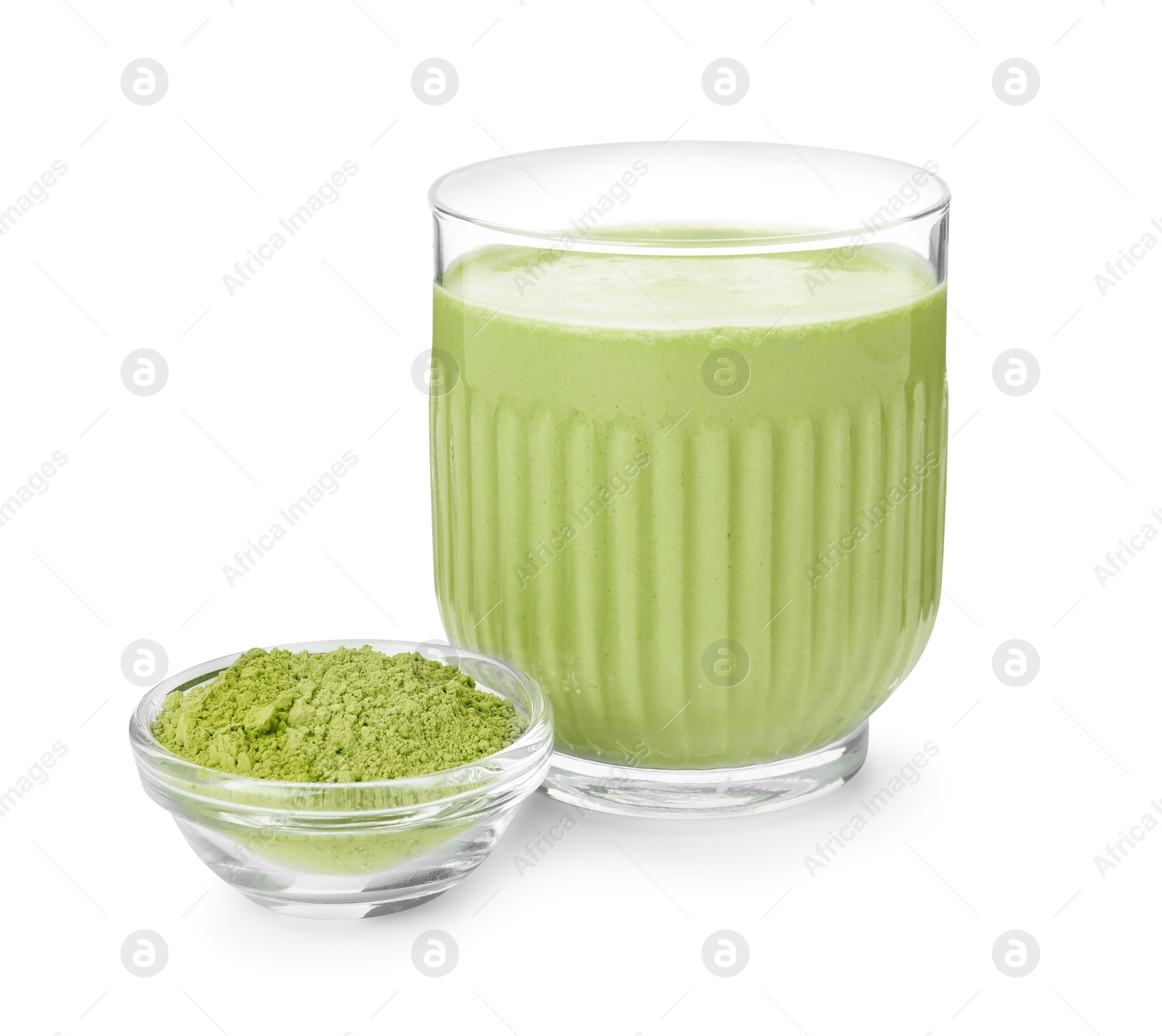 Photo of Glass of tasty matcha smoothie and powder isolated on white