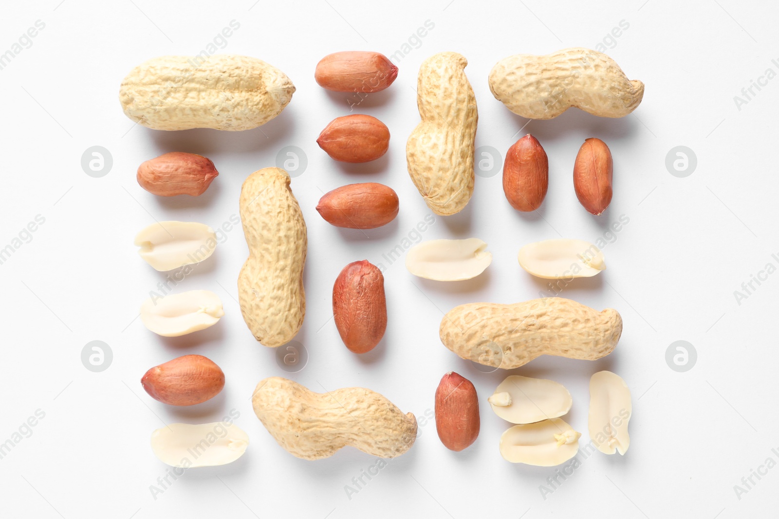 Photo of Fresh peanuts on white background, flat lay