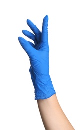 Photo of Woman in blue latex gloves holding something on white background, closeup of hand