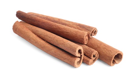 Dry aromatic cinnamon sticks isolated on white