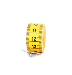 Yellow rolled measuring tape isolated on white