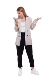 Photo of Angry businesswoman with smartphone on white background
