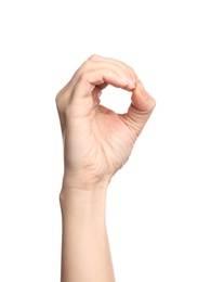 Photo of Woman showing O letter on white background, closeup. Sign language