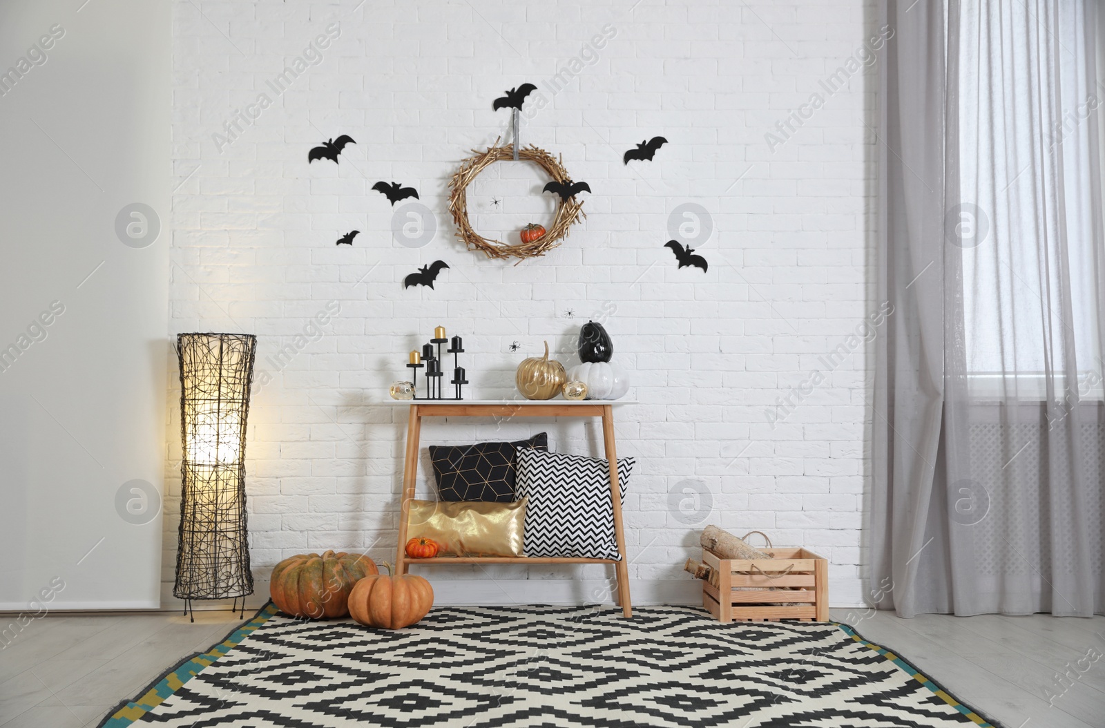 Photo of Stylish interior of room decorated for Halloween holiday