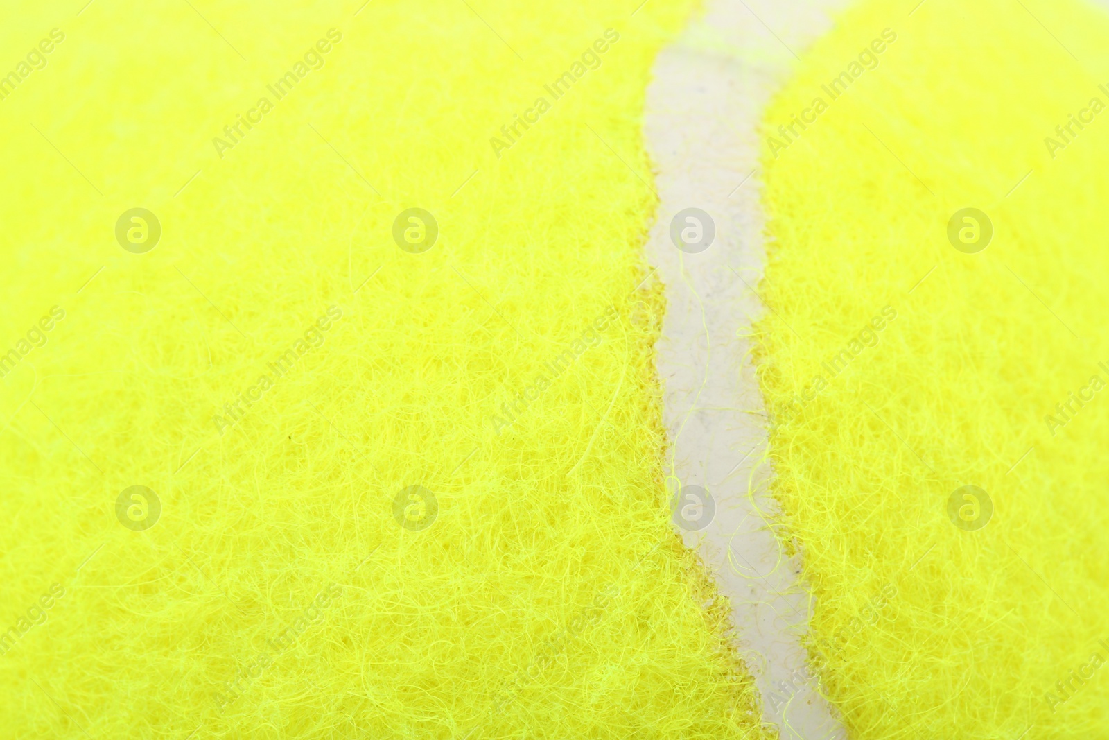 Photo of One tennis ball as background, closeup view