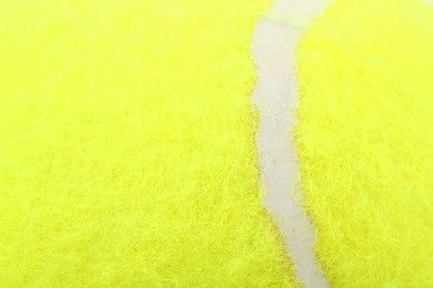 One tennis ball as background, closeup view