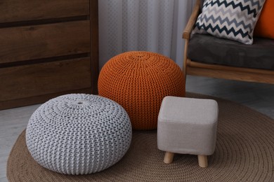 Photo of Stylish comfortable poufs in room. Home design