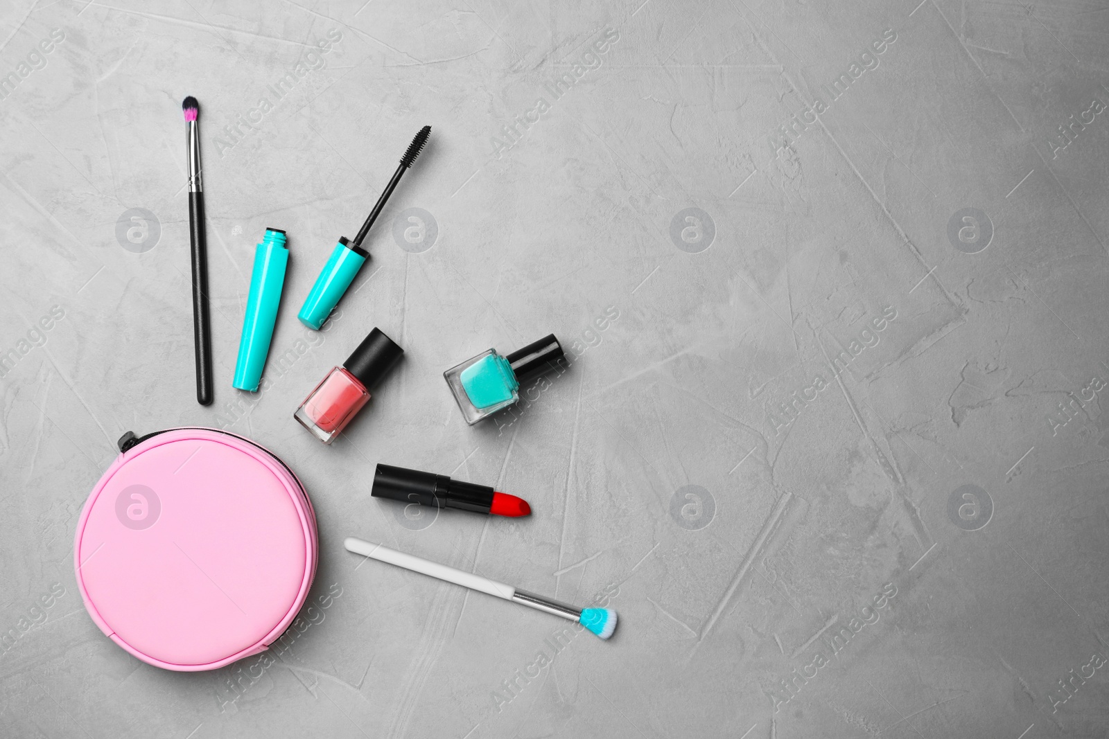 Photo of Flat lay composition with cosmetic products on grey background