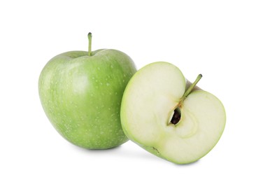 Photo of Whole and cut apples on white background