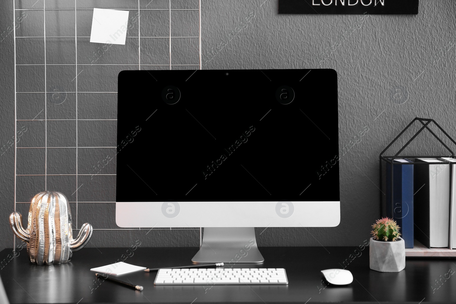 Photo of Comfortable workplace with computer on desk in home office