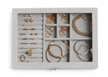 Jewelry box with many different golden accessories isolated on white, top view
