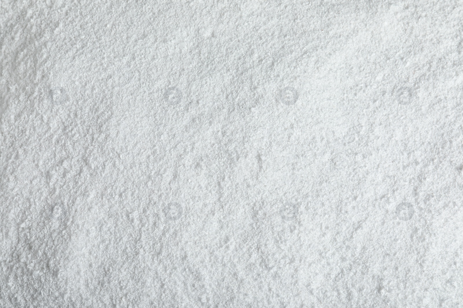 Photo of Pile of white snow as background, top view