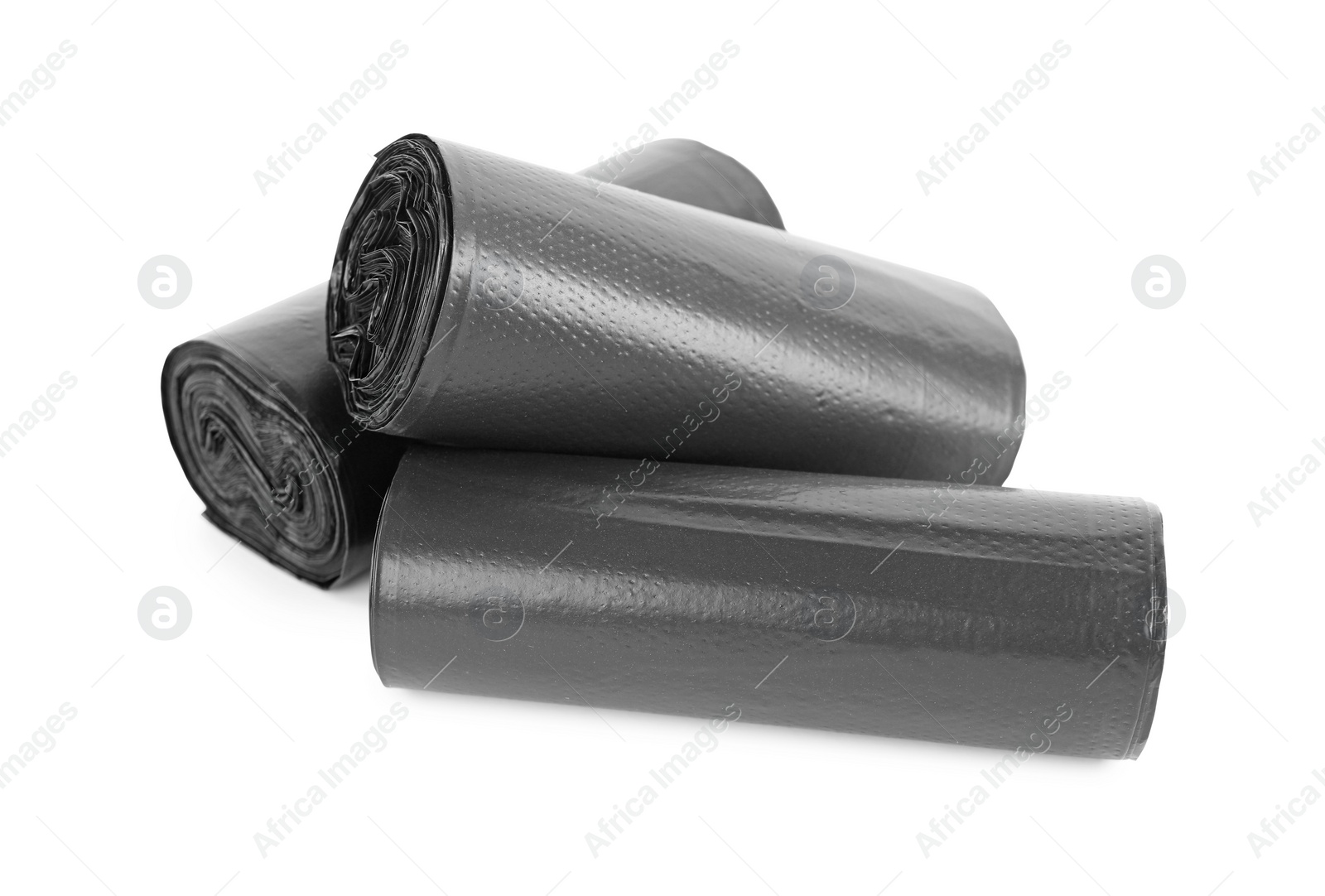 Photo of Rolls of black garbage bags isolated on white