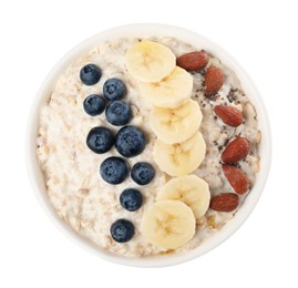 Photo of Tasty boiled oatmeal with blueberries, banana, almonds and chia seeds in bowl isolated on white, top view