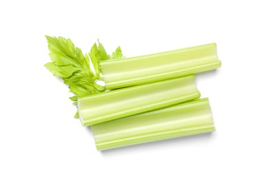 Photo of Fresh green cut celery isolated on white, top view