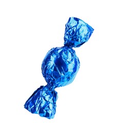 Photo of Tasty candy in blue wrapper isolated on white
