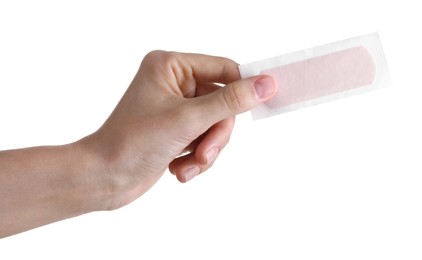 Photo of Woman holding medical adhesive bandage isolated on white, closeup