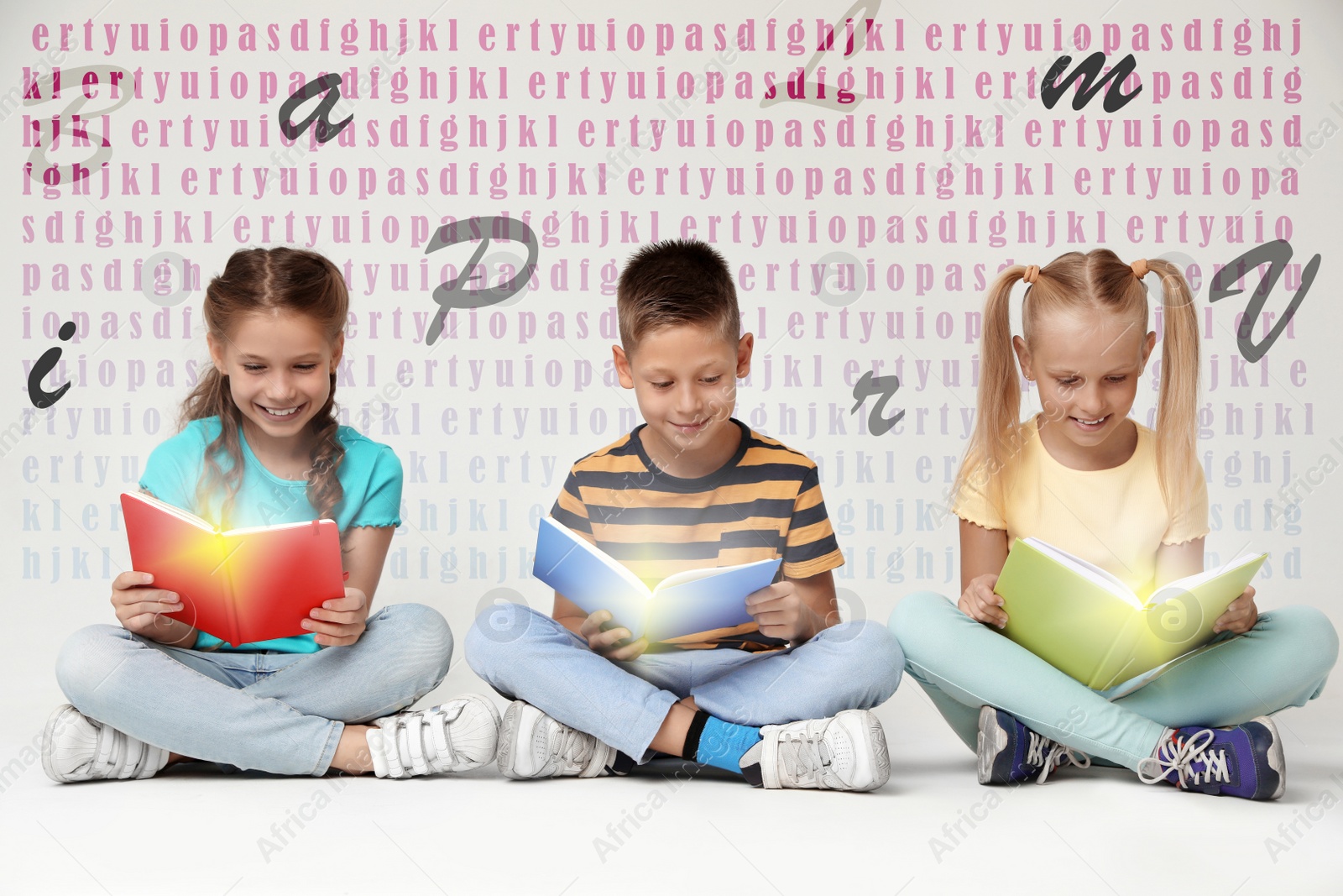 Image of Little children reading books on grey background