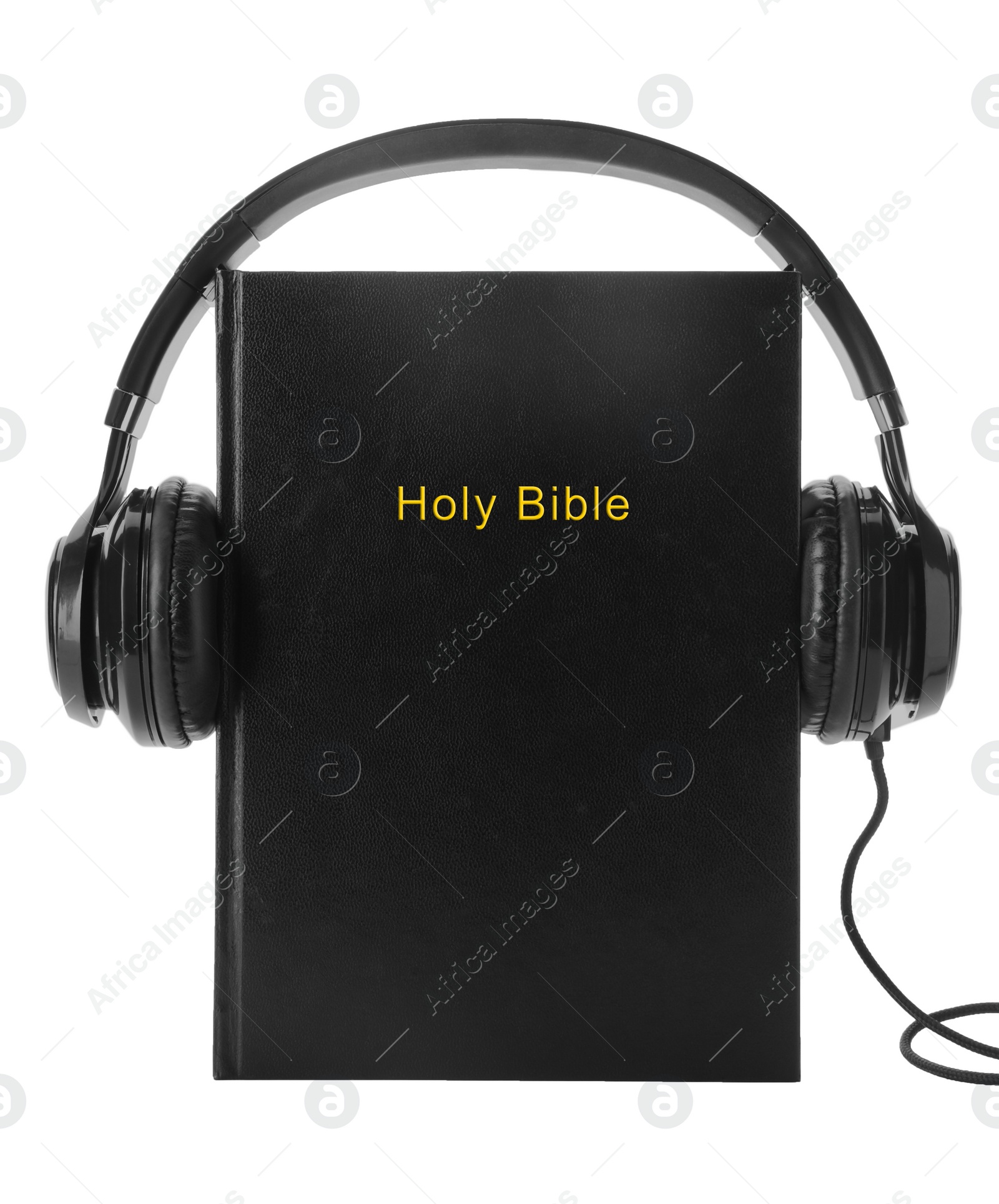 Photo of Bible and headphones on white background. Religious audiobook