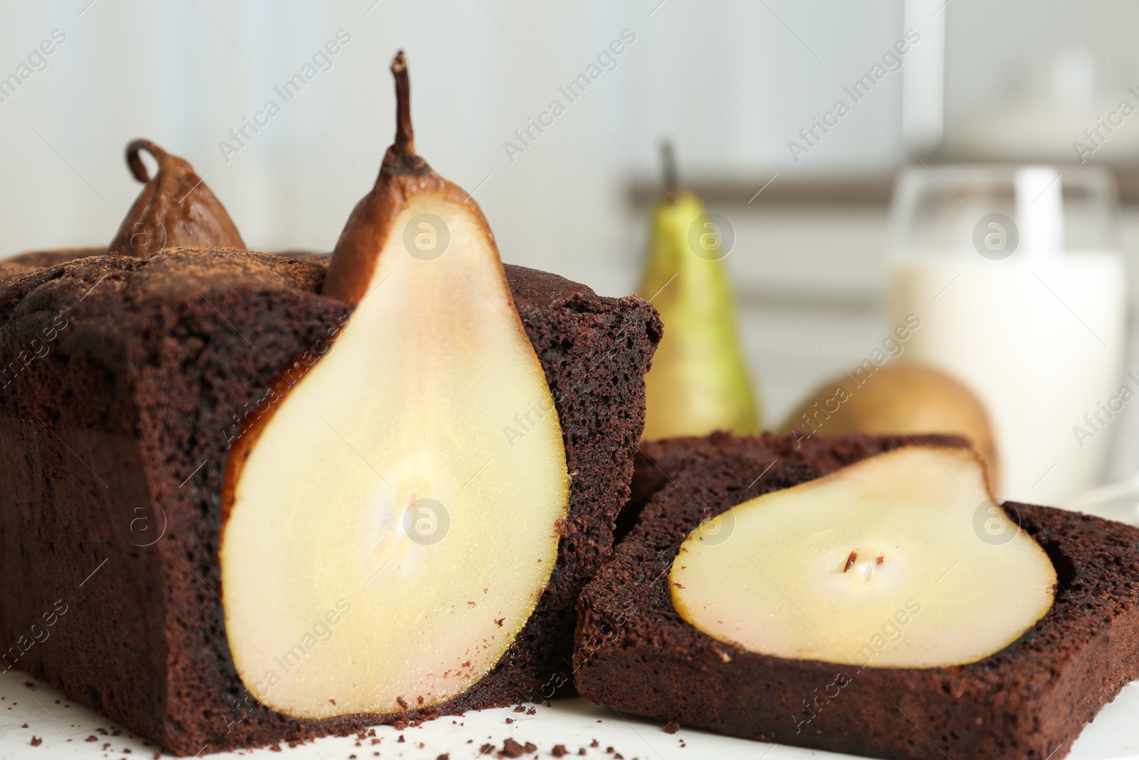 Photo of Tasty pear bread on table, closeup. Homemade cake