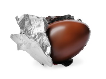 Tasty chocolate egg in foil isolated on white