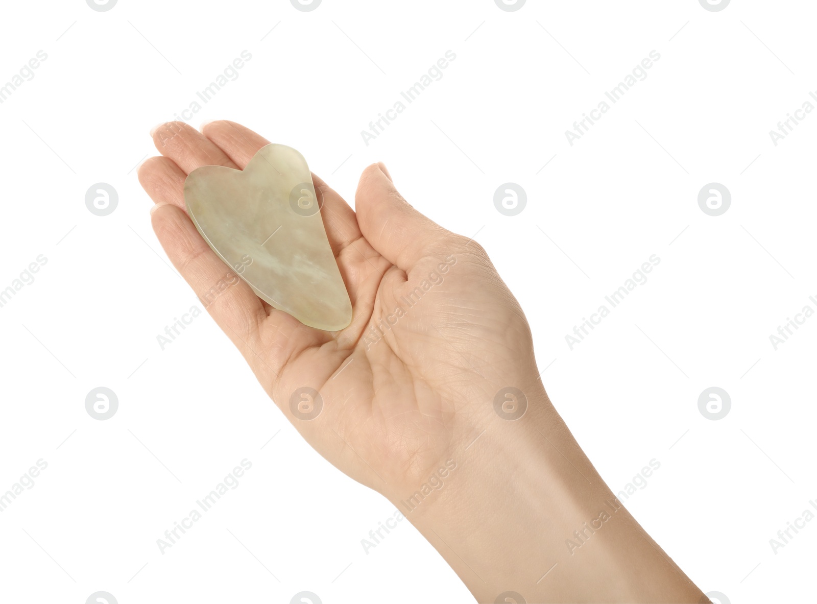 Photo of Woman with jade gua sha tool on white background, closeup