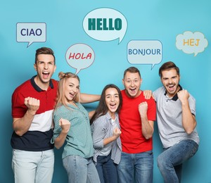 Image of Happy people and illustration of speech bubbles with word Hello written in different languages on light blue background