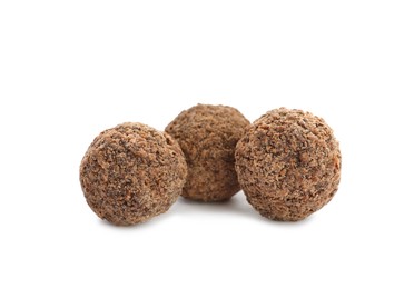 Photo of Delicious sweet chocolate truffles on white background