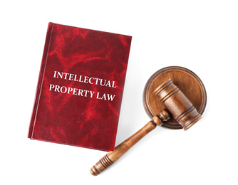 Image of Intellectual Property law book and judge's gavel on white background, top view