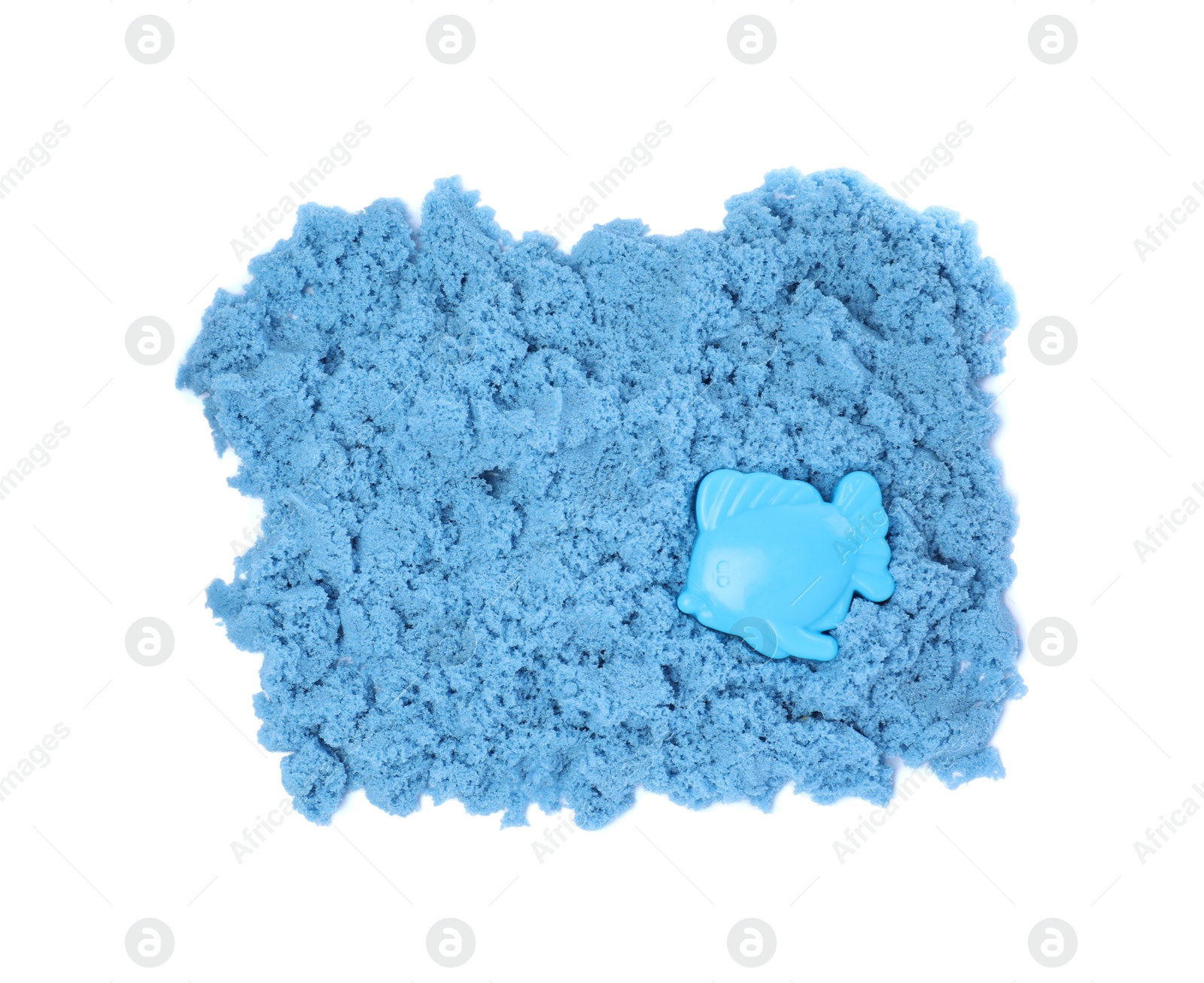 Photo of Blue kinetic sand and toy on white background, top view