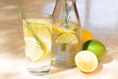 Summer refreshing lemonade and ingredients on light table