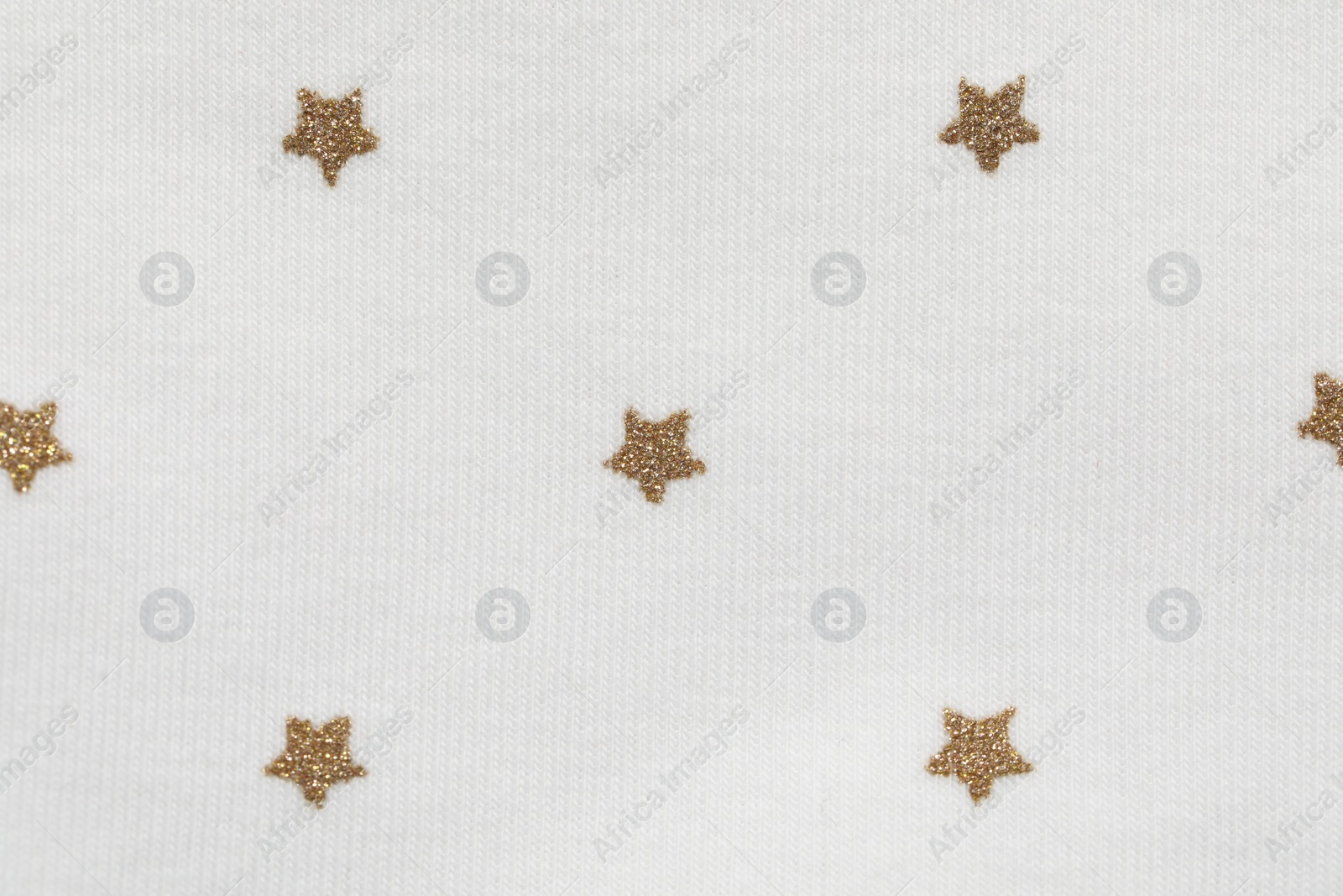 Photo of Texture of white fabric with stars as background, top view