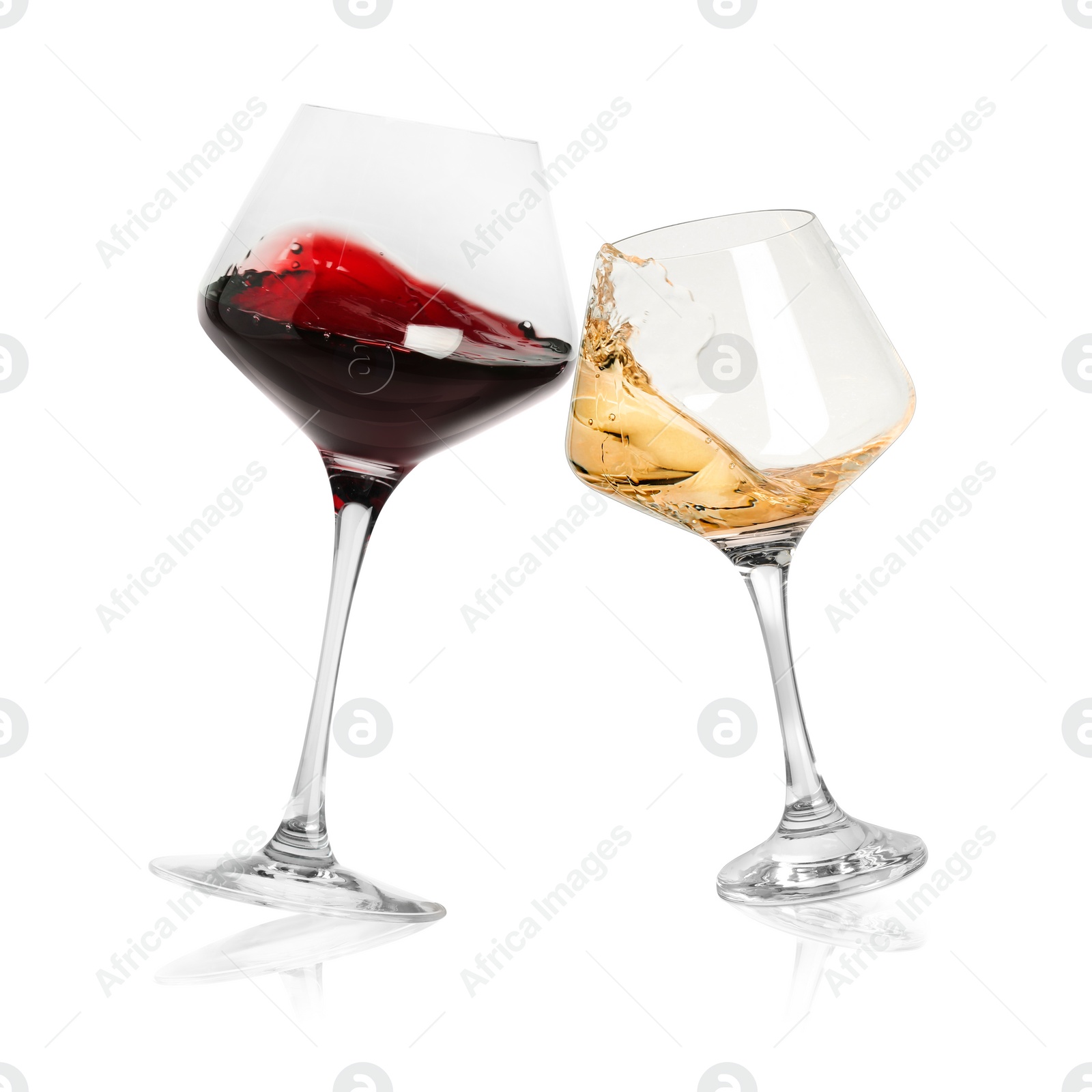 Image of Different types of wine splashing in glasses on white background