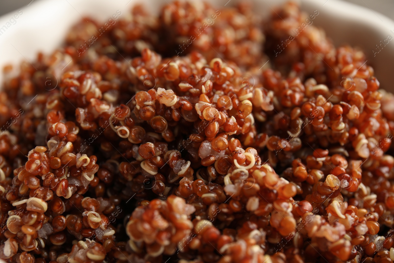 Photo of Cooked red quinoa in bowl, closeup view