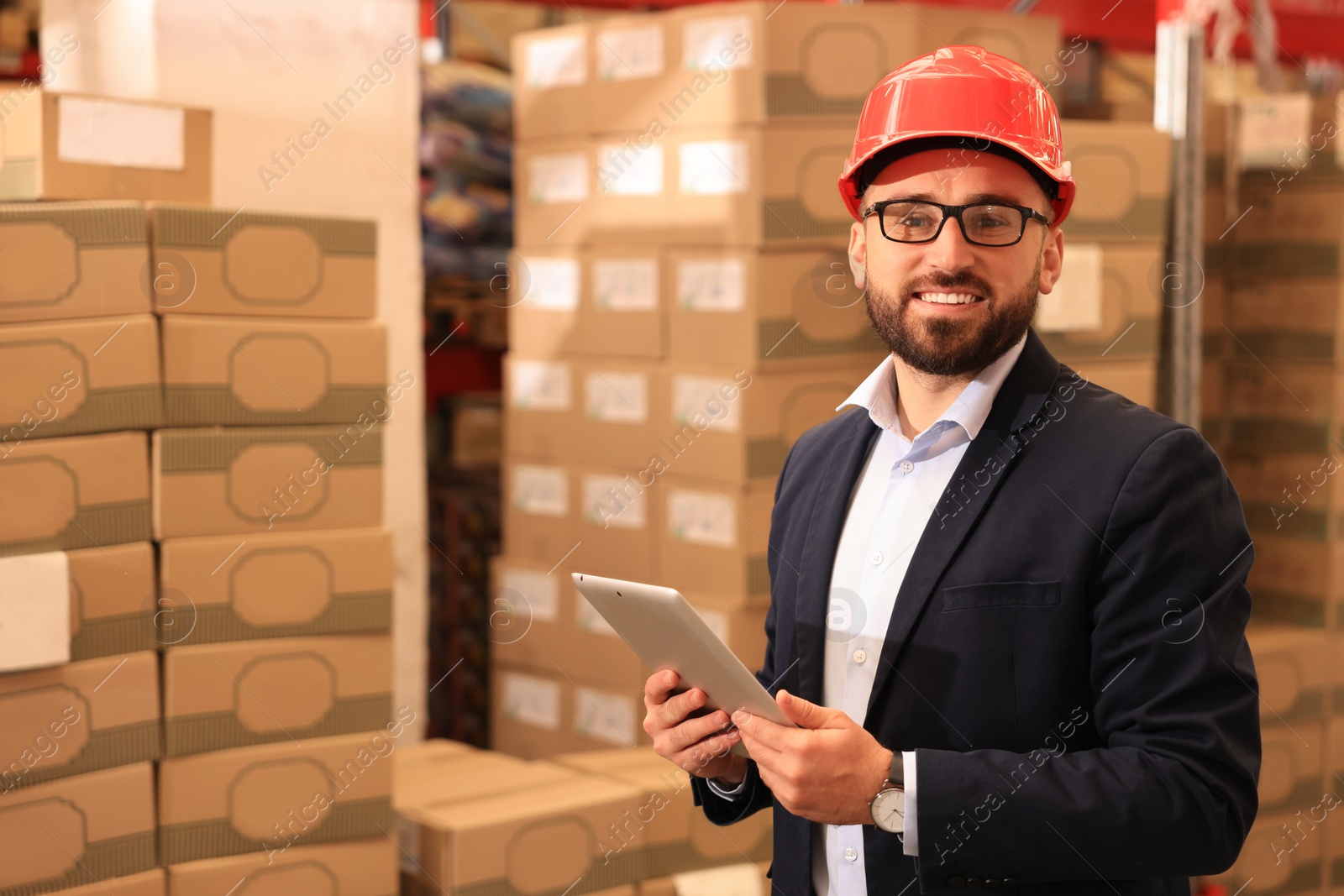 Image of Manager with tablet working at warehouse. Logistics center