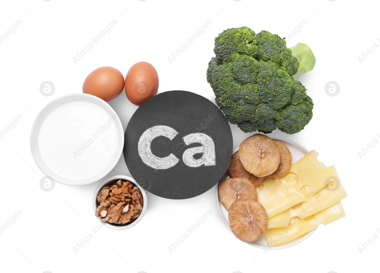 Photo of Set of natural food high in calcium on white background, top view