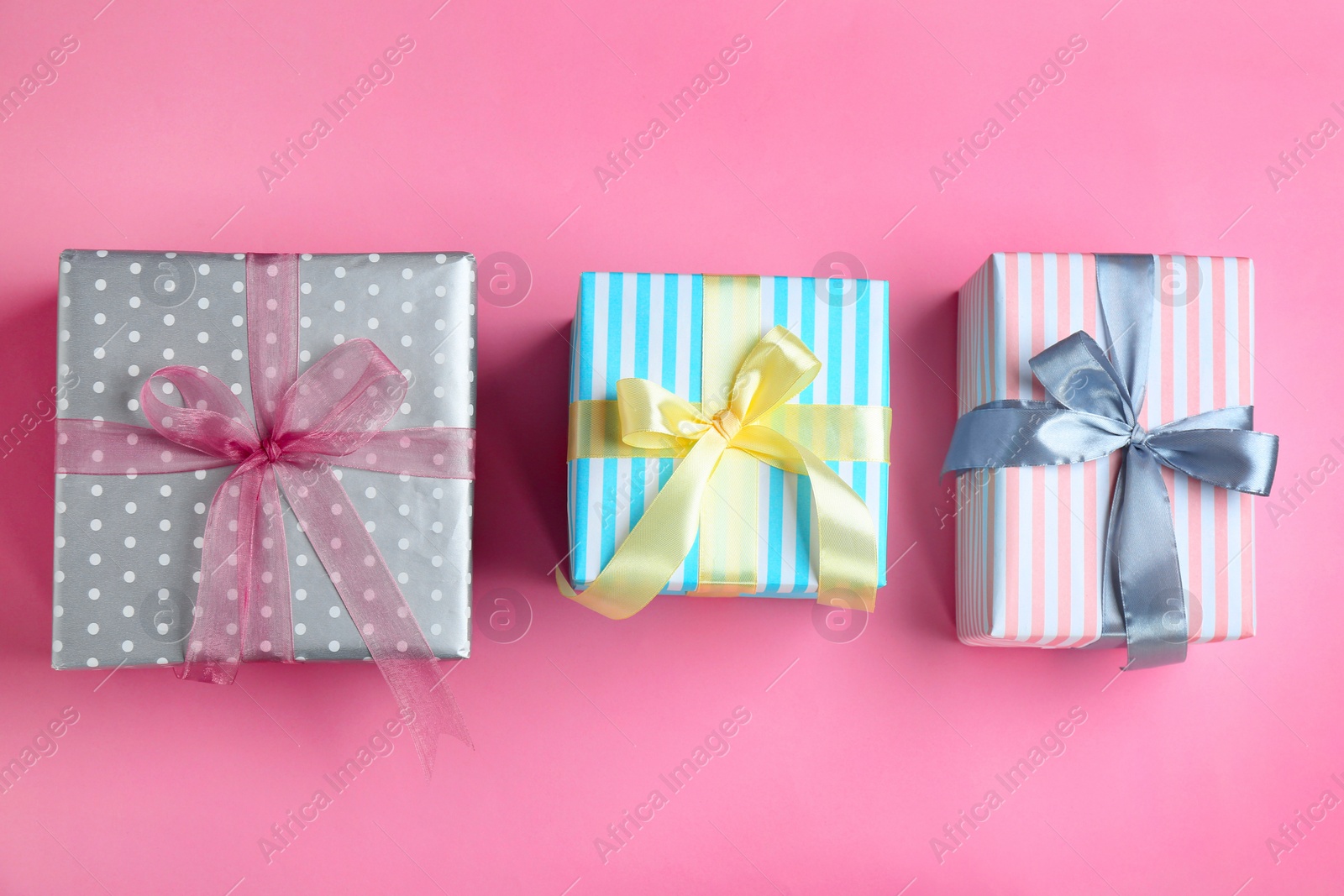 Photo of Different gift boxes on color background, flat lay