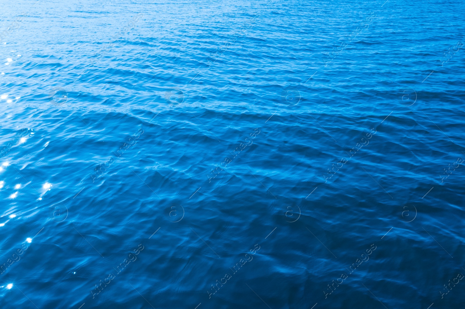 Image of Beautiful ripply sea water surface on sunny day as background