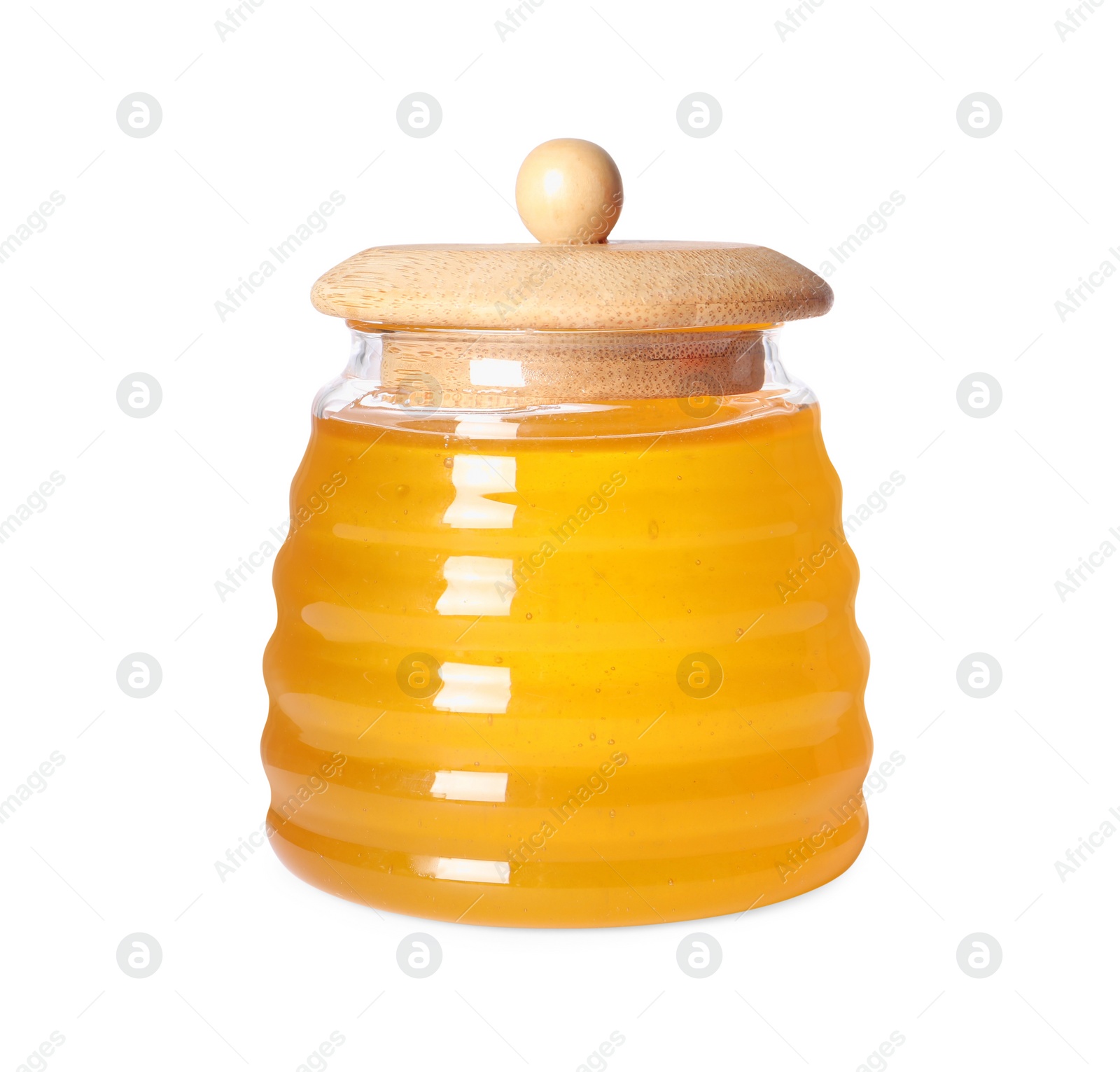 Photo of Tasty natural honey in glass jar isolated on white