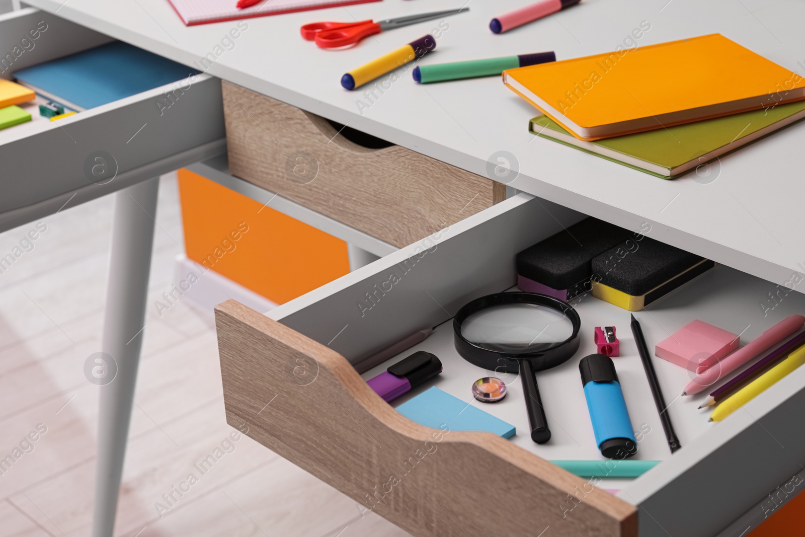 Photo of Office supplies in open desk drawer indoors, space for text
