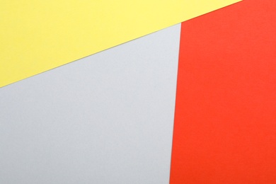 Colorful paper sheets as background, top view