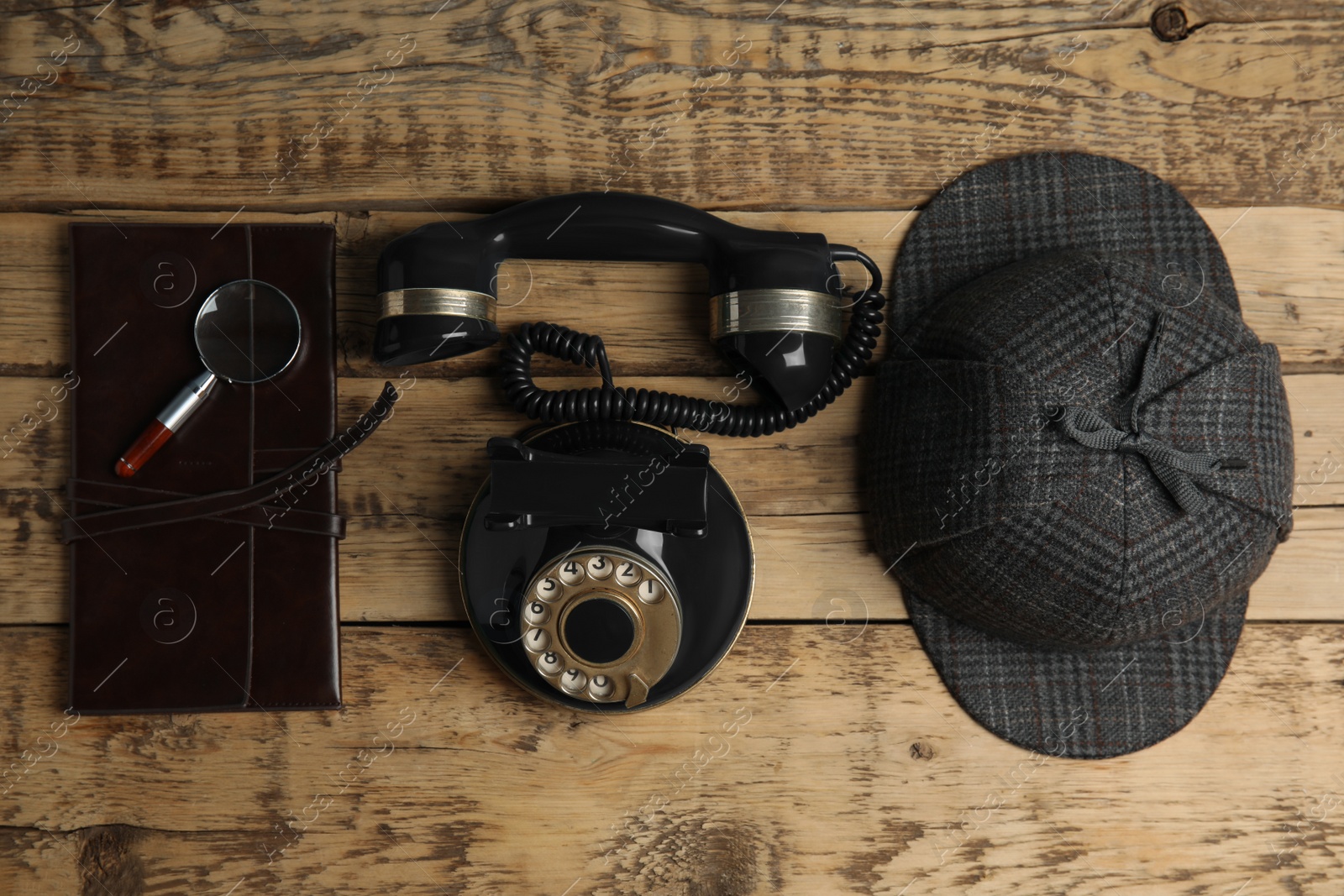 Photo of Flat lay composition with vintage detective items on wooden table