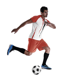 Young man playing football on white background